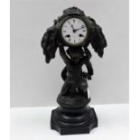 A spelter clock by Henri Marc 16.5in high