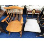 A light wood rocking chair twined with an antique