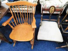 A light wood rocking chair twined with an antique