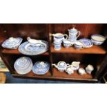 A quantity of blue & white Willow transferware din