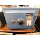 A small key & combination operated safe 15.75in wi