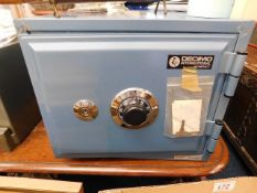 A small key & combination operated safe 15.75in wi