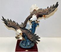 A mounted resin eagle group 20in high