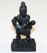 A 19thC. bronze figure with club, possibly Malayan