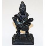 A 19thC. bronze figure with club, possibly Malayan