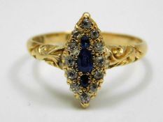 An antique 18ct gold ring set with sapphire & diamond with carved shank size N 3g