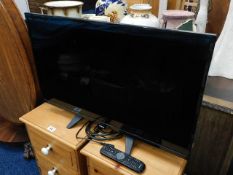 A Philips television with remote control, PAT tested as pass