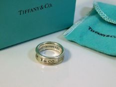 A Tiffany & Co. silver "1837" ring with pouch & bo
