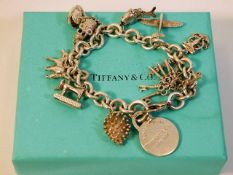 A boxed Tiffany & Co. silver bracelet with later a
