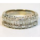 An 18ct white gold half eternity ring set with app