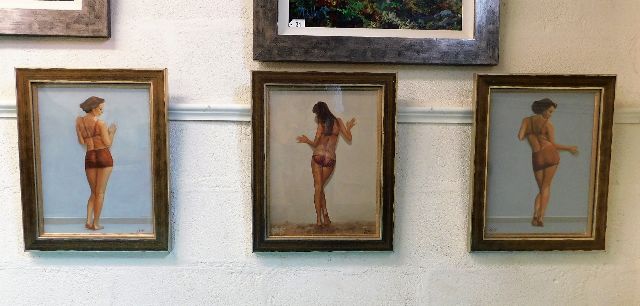 Three framed 50's style oil on panel of bikini gir