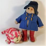 A Paddington bear figure 23in tall twinned with Ba