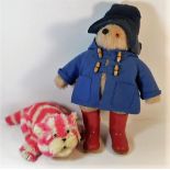 A Paddington bear figure 23in tall twinned with Ba