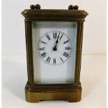 A miniature French brass carriage clock by Henri J