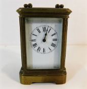 A miniature French brass carriage clock by Henri J