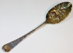 A George II silver berry spoon by Thomas Whipham,