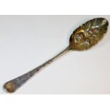 A George II silver berry spoon by Thomas Whipham,