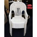 Four moulded plastic garden chairs