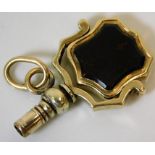 A small Victorian watch key, tests at least 9ct go