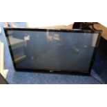 A LG flat screen wall mounted TV, approx. 41in scr