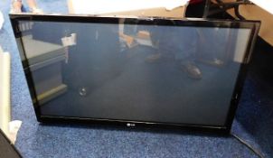 A LG flat screen wall mounted TV, approx. 41in scr