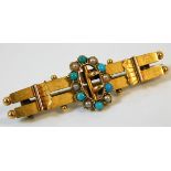 A 15ct gold brooch set with turquoise & seed pearl