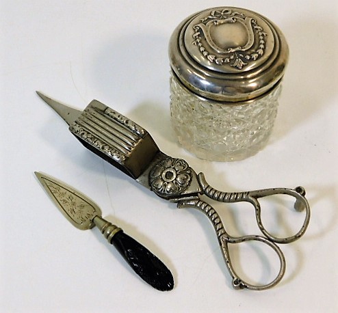 A set of plated wick trimmers, a silver lidded tid