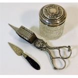 A set of plated wick trimmers, a silver lidded tid
