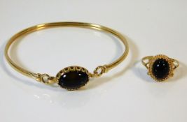 A similar 9ct gold bracelet & ring set mounted wit