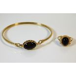 A similar 9ct gold bracelet & ring set mounted wit