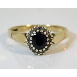 A 9ct gold sapphire & diamond ring 3.2g size O/P