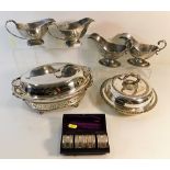 Two pairs of antique silver plated sauce boats, a