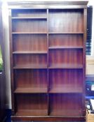 Two mahogany style bookcases 74.5in high x 48in wi