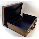A vintage leather briefcase 15.5in wide x 11.5in d