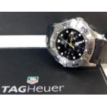 A gents automatic Tag Heuer divers watch with inte