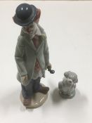 A Lladro figure of clown, approx 8in twinned with