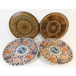 A pair of Japanese Imari plates twinned with two P
