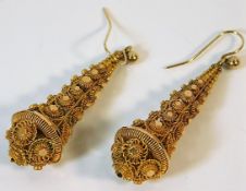 A pair of Asian yellow metal earrings, test as hig
