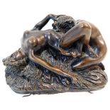 A bronze style erotica ornament featuring two fema