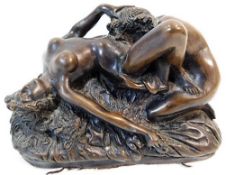 A bronze style erotica ornament featuring two fema