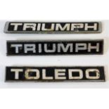 Three Triumph & Toledo motor car badges 6.25in lon
