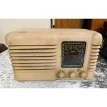 A cream bakelite style radio a/f