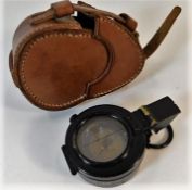 A WW2 era compass with pouch a/f