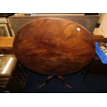 An 18thC. mahogany tilt top table 32.5in diameter