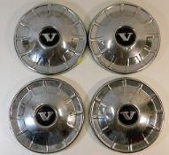 A set of four chrome Volvo wheel covers, 9.5in dia