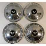 A set of four chrome Volvo wheel covers, 9.5in dia