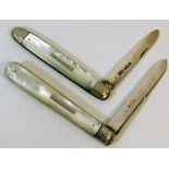 Two silver bladed fruit knives with mother of pear