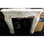 A decorative & ornate cast fire surround