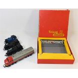 A boxed Tri-ang level crossing & four engines incl