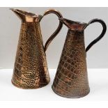 Two decorative copper water jugs, 11in & 10in tall